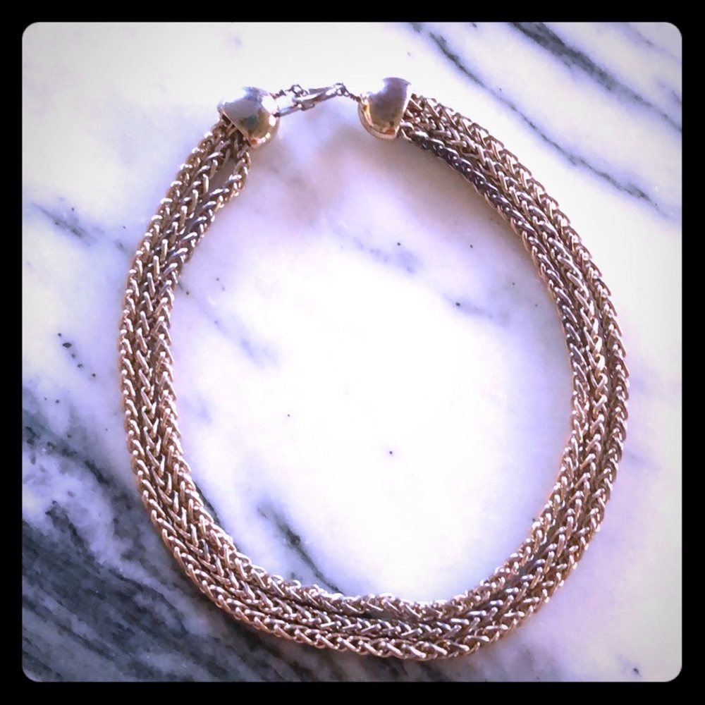 Faux gold layered statement necklace.